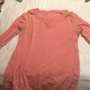 Woman’s salmon color long sleeve tee